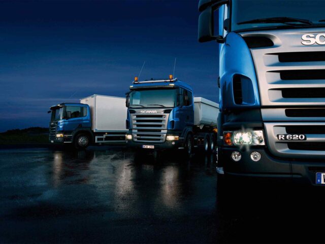 Three-trucks-on-blue-background-1-640x480.jpg